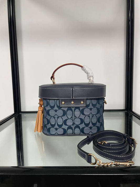 C•ach blue denim Kay Crossbody