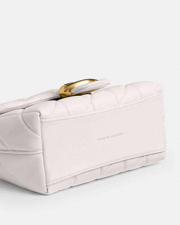 C•ach Tabby Top Handle Bag (white)