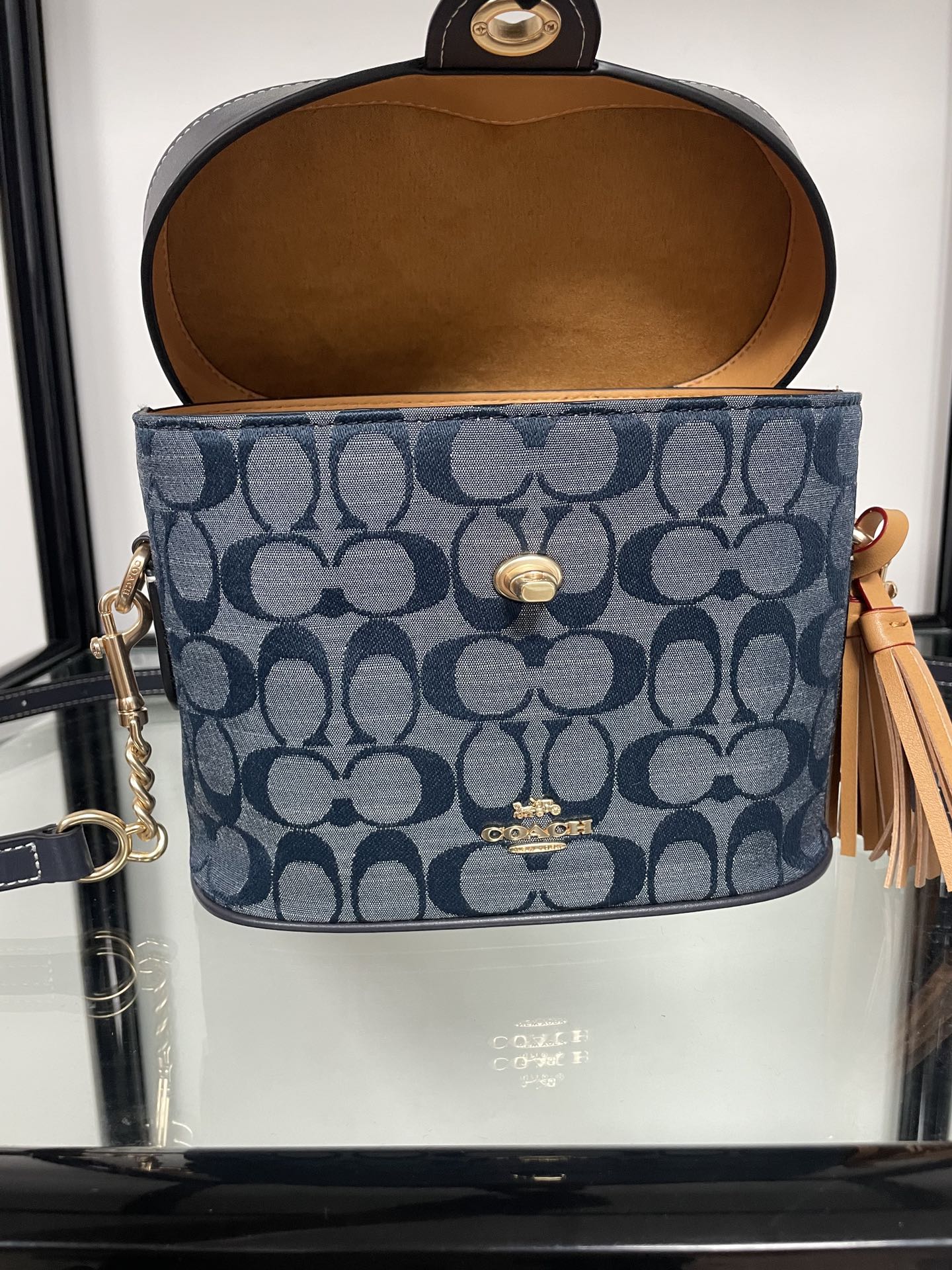 C•ach blue denim Kay Crossbody